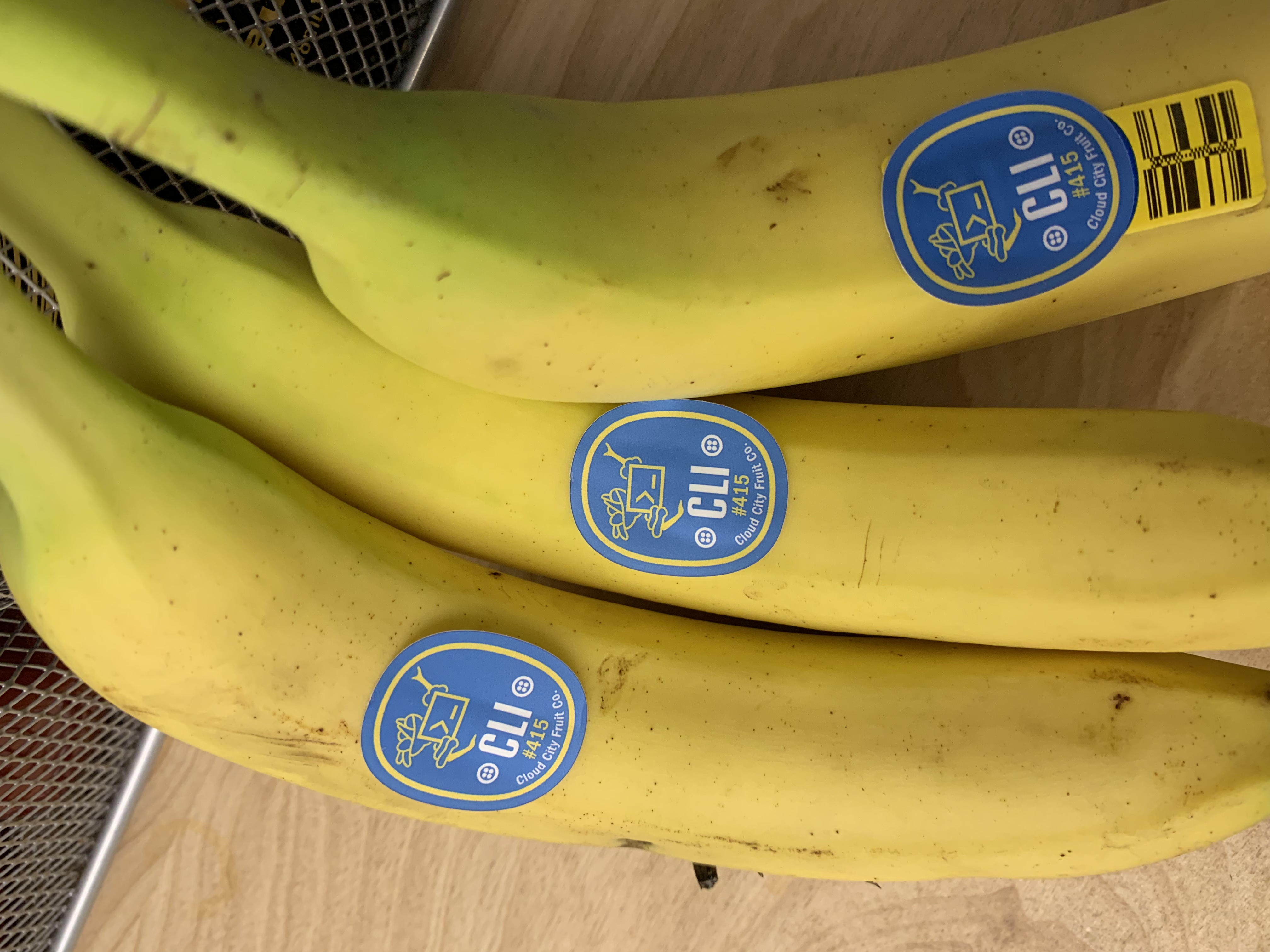 CLI launch stickers on bananas in the office kitchen — because absurdity is memorable